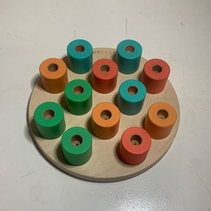 Lovevery Wooden Stacking Peg Board from “The Adventurer Play Kit”